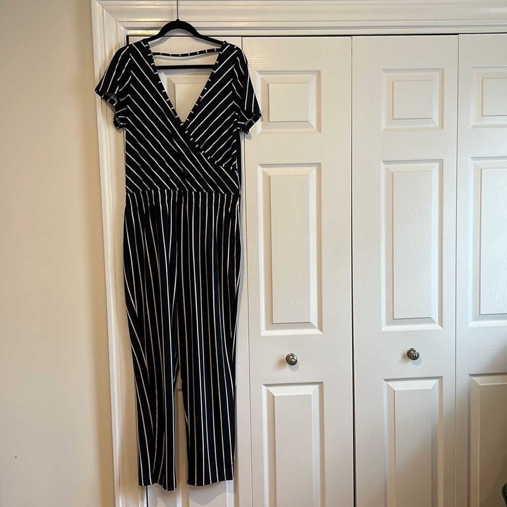 Trovare - Deep V In The Front And Back Jumpsuit. - image 1